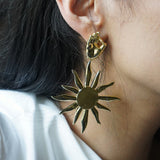 Arqa hand motif hanging earrings